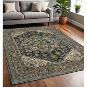 Photo of Blue And Green Oriental Power Loom Area Rug With Fringe