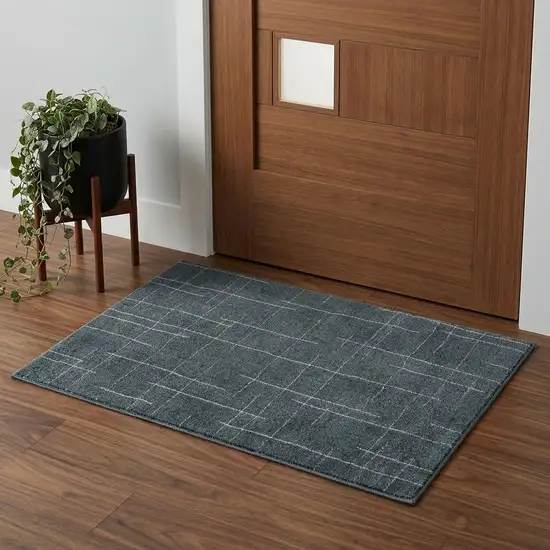 Blue And Beige Geometric Distressed Area Rug Photo 1