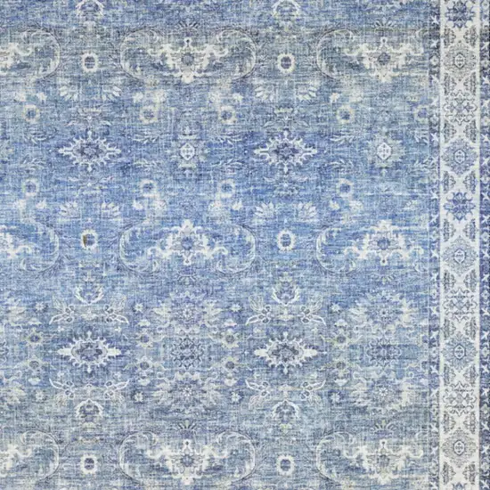Blue And Ivory Oriental Distressed Area Rug Photo 5