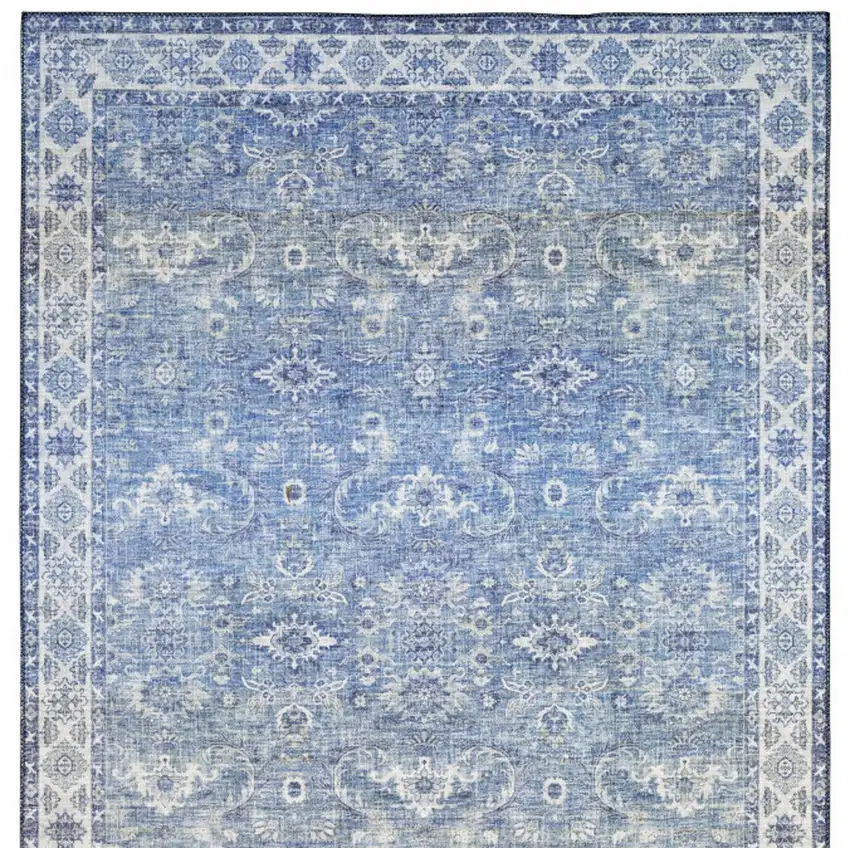 Blue And Ivory Oriental Distressed Area Rug Photo 6