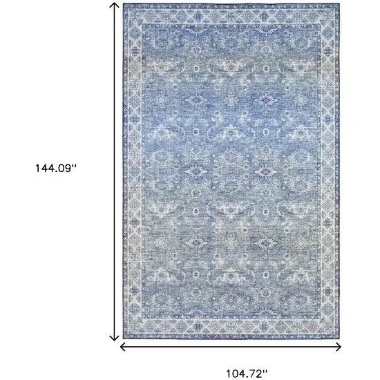 Blue And Ivory Oriental Distressed Area Rug Photo 3