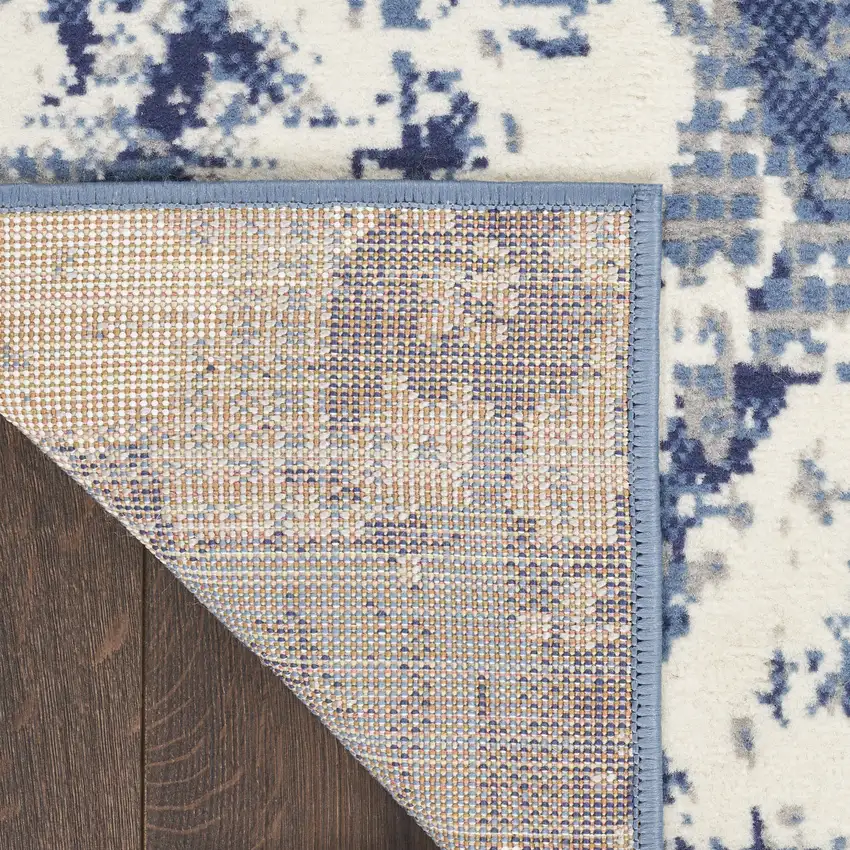 Blue And Ivory Abstract Area Rug Photo 9