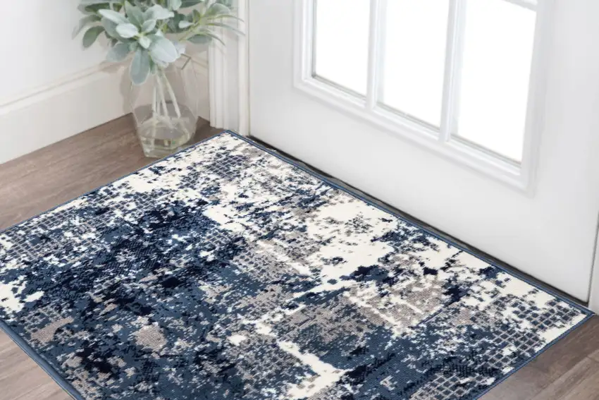 Blue And Ivory Abstract Area Rug Photo 1