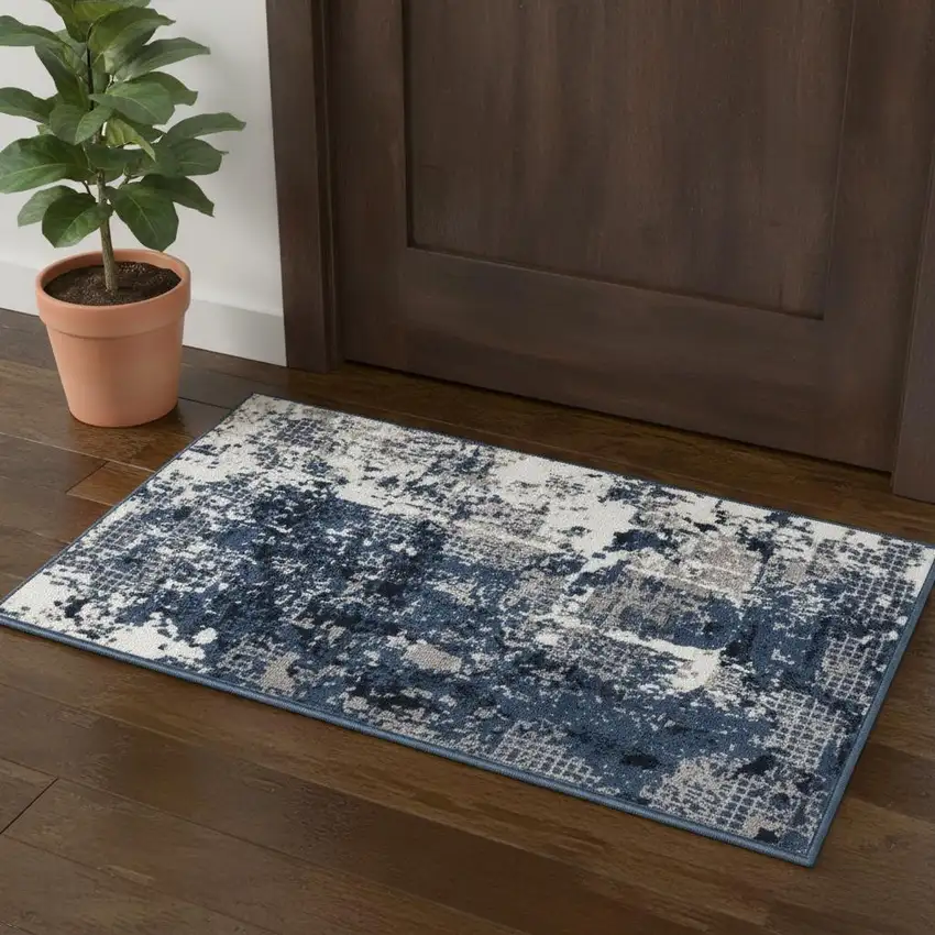 Blue And Ivory Abstract Area Rug Photo 1