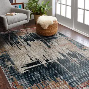 Photo of Blue And Ivory Abstract Area Rug