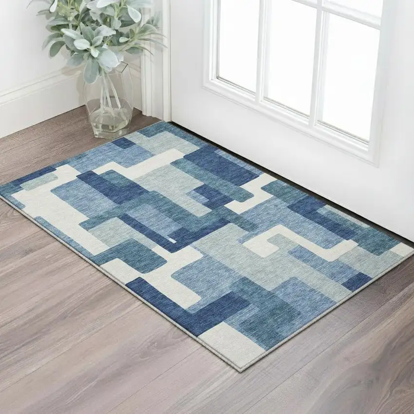 Blue And Ivory Abstract Geometric Washable Area Rug With UV Protection Photo 2