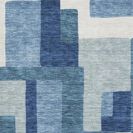 Blue And Ivory Abstract Geometric Washable Area Rug With UV Protection Photo 3