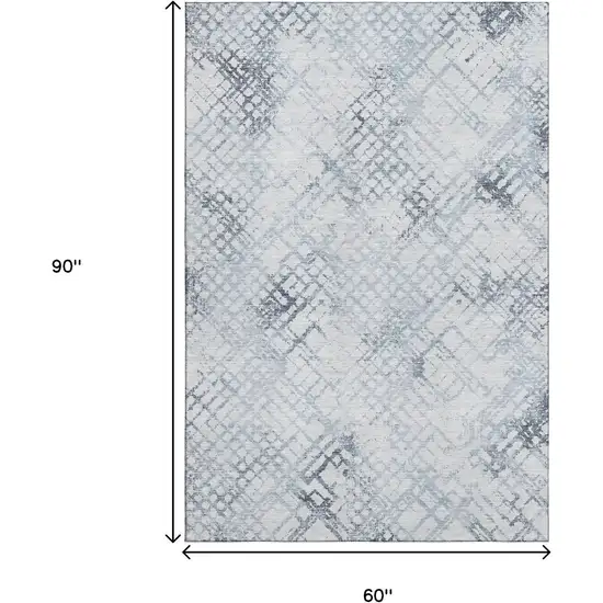 Blue And Ivory Abstract Geometric Washable Area Rug With UV Protection Photo 3