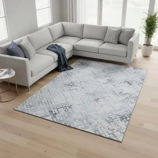 Blue And Ivory Abstract Geometric Washable Area Rug With UV Protection Photo 2