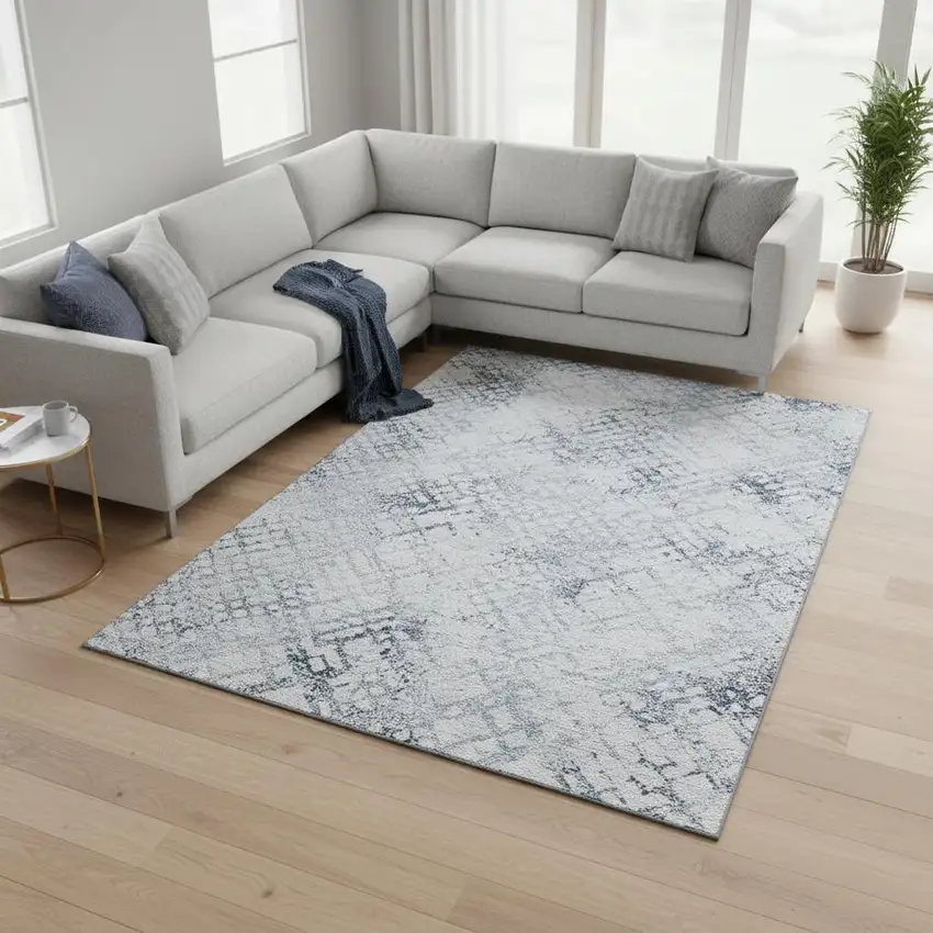 Blue And Ivory Abstract Geometric Washable Area Rug With UV Protection Photo 2