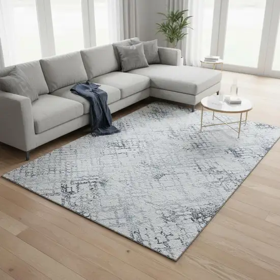 Blue And Ivory Abstract Geometric Washable Area Rug With UV Protection Photo 2