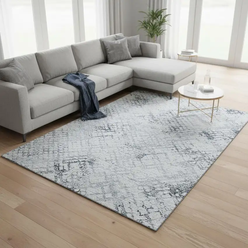 Blue And Ivory Abstract Geometric Washable Area Rug With UV Protection Photo 2