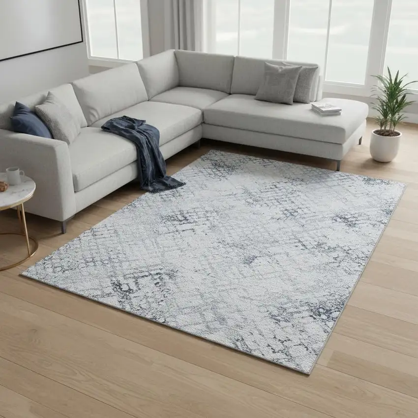 Blue And Ivory Abstract Geometric Washable Area Rug With UV Protection Photo 2