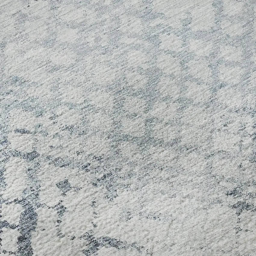 Blue And Ivory Abstract Geometric Washable Area Rug With UV Protection Photo 9