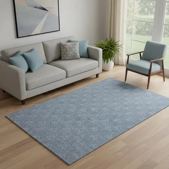 Blue And Ivory Abstract Geometric Washable Area Rug With UV Protection Photo 1
