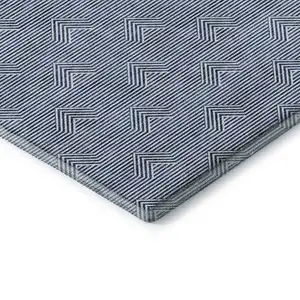 Photo of Blue And Ivory Abstract Geometric Washable Area Rug With UV Protection