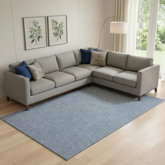 Blue And Ivory Abstract Geometric Washable Area Rug With UV Protection Photo 1