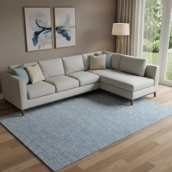 Blue And Ivory Abstract Geometric Washable Area Rug With UV Protection Photo 1