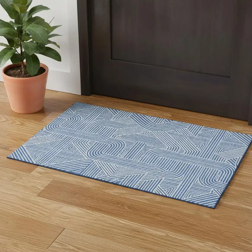 Blue And Ivory Abstract Geometric Washable Area Rug With UV Protection Photo 1