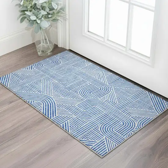 Blue And Ivory Abstract Geometric Washable Area Rug With UV Protection Photo 2