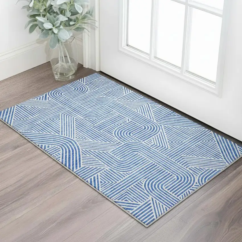 Blue And Ivory Abstract Geometric Washable Area Rug With UV Protection Photo 2
