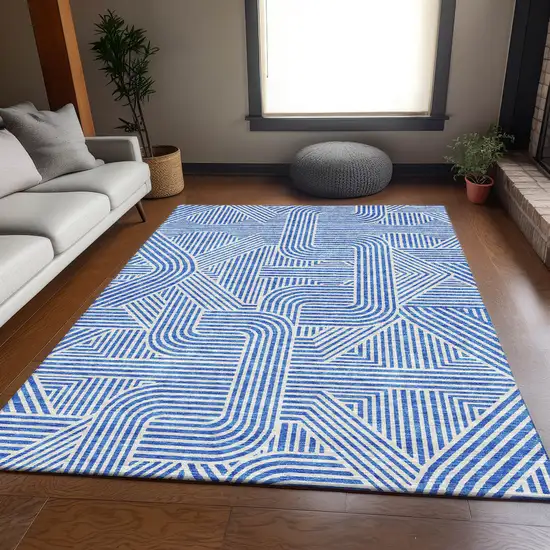 Blue And Ivory Abstract Geometric Washable Area Rug With UV Protection Photo 6