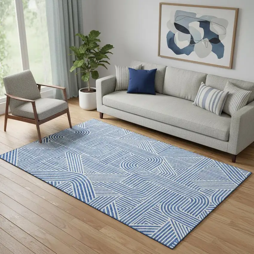 Blue And Ivory Abstract Geometric Washable Area Rug With UV Protection Photo 1