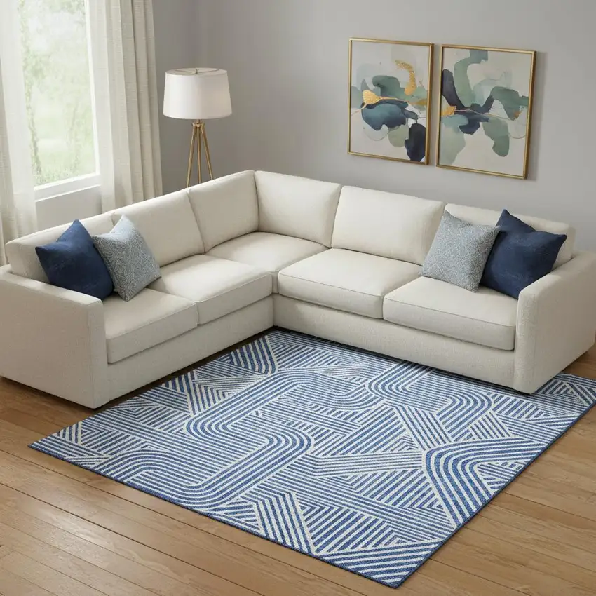 Blue And Ivory Abstract Geometric Washable Area Rug With UV Protection Photo 1