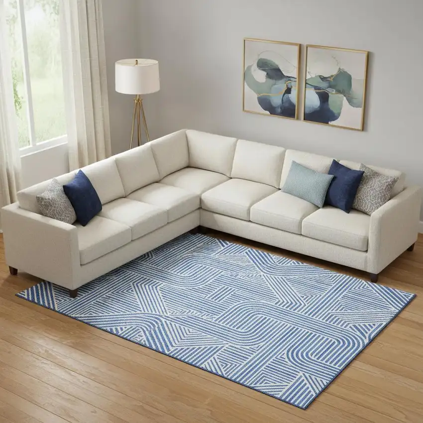 Blue And Ivory Abstract Geometric Washable Area Rug With UV Protection Photo 1
