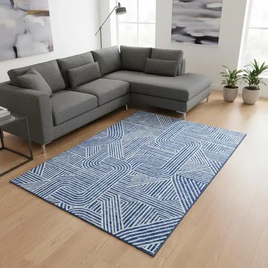 Blue And Ivory Abstract Geometric Washable Area Rug With UV Protection Photo 2