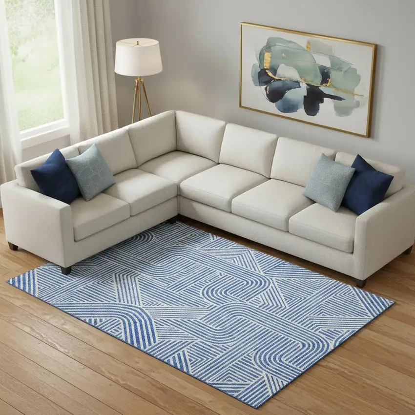 Blue And Ivory Abstract Geometric Washable Area Rug With UV Protection Photo 1