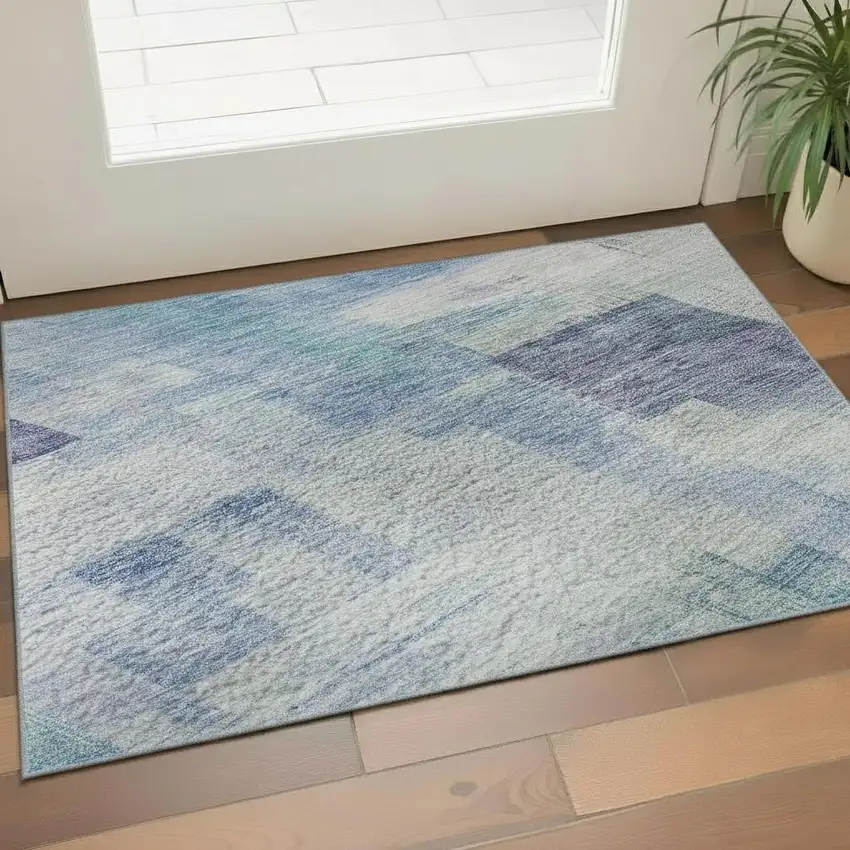 Blue And Ivory Abstract Geometric Washable Area Rug With UV Protection Photo 2