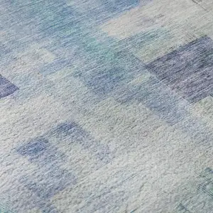 Photo of Blue And Ivory Abstract Geometric Washable Area Rug With UV Protection