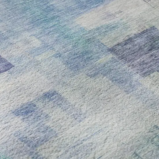 Blue And Ivory Abstract Geometric Washable Area Rug With UV Protection Photo 1