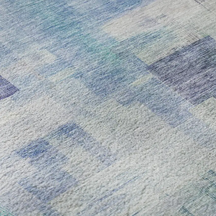 Blue And Ivory Abstract Geometric Washable Area Rug With UV Protection Photo 1