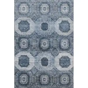 Photo of Blue And Ivory Abstract Geometric Washable Area Rug With UV Protection