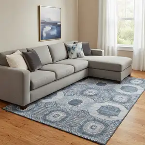 Photo of Blue And Ivory Abstract Geometric Washable Area Rug With UV Protection