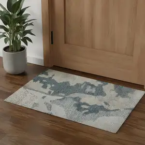 Photo of Blue And Ivory Abstract Hand Tufted Area Rug