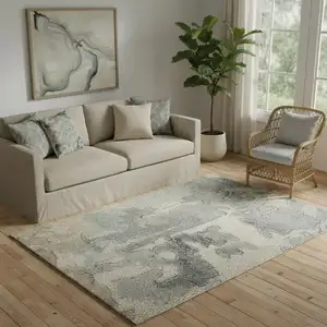 Photo of Blue And Ivory Abstract Hand Tufted Area Rug