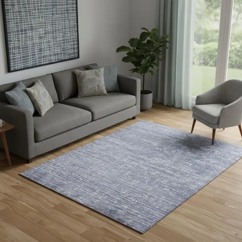 Blue And Ivory Abstract Hand Woven Area Rug Photo 1