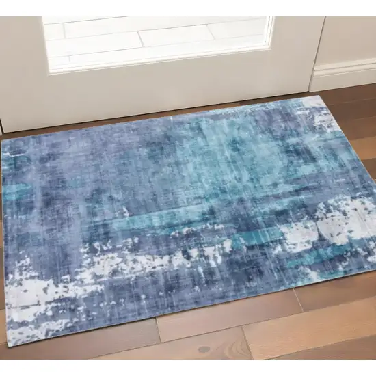 Blue And Ivory Abstract Hand Woven Area Rug Photo 1