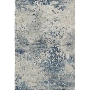 Photo of Blue And Ivory Abstract Washable Area Rug With UV Protection