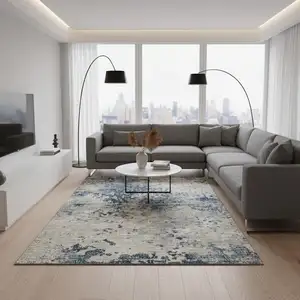 Photo of Blue And Ivory Abstract Washable Area Rug With UV Protection