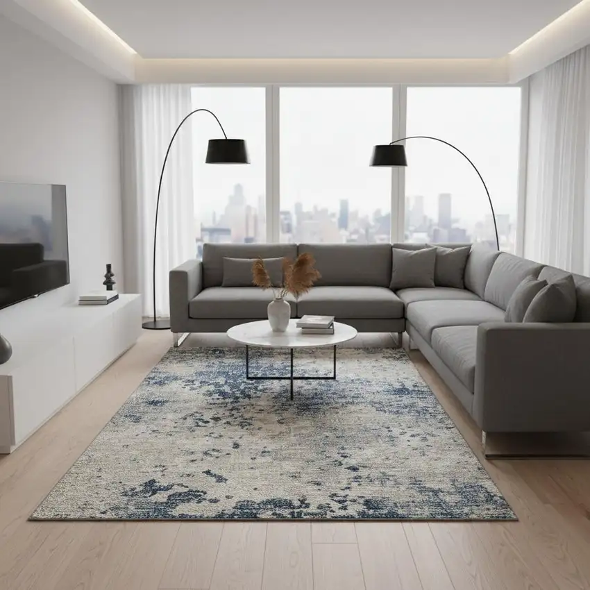 Blue And Ivory Abstract Washable Area Rug With UV Protection Photo 1