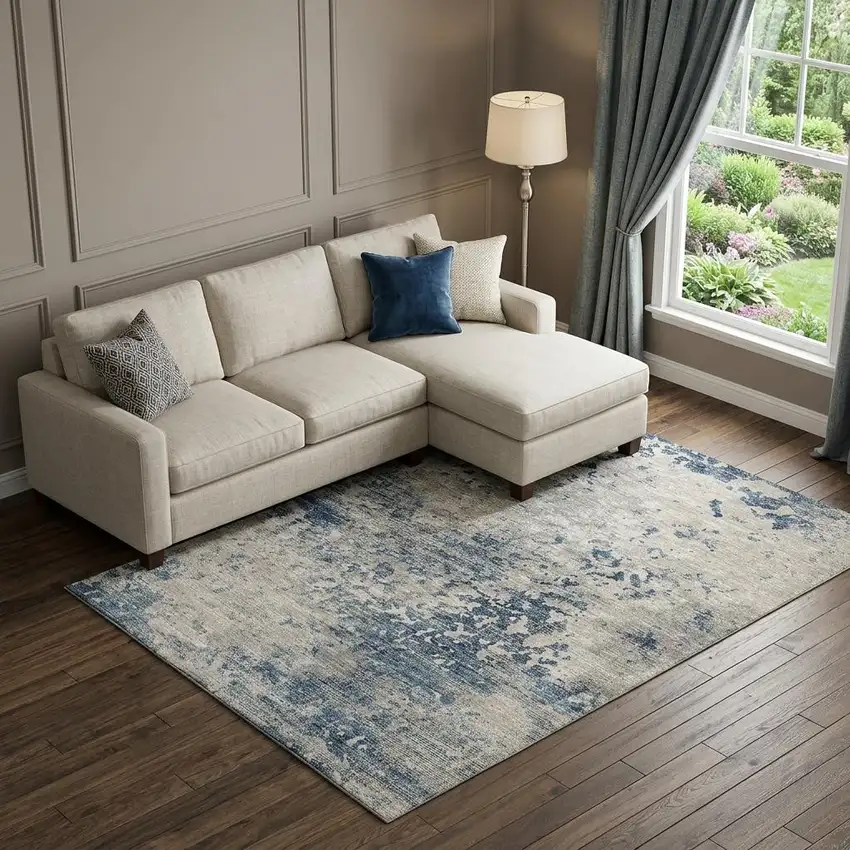 Blue And Ivory Abstract Washable Area Rug With UV Protection Photo 1