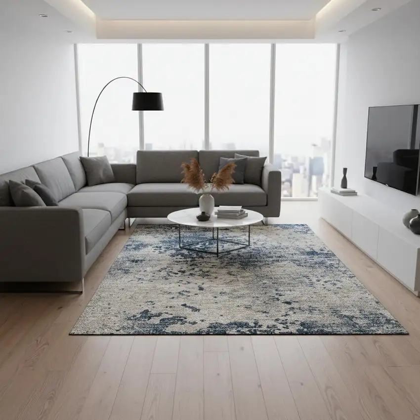 Blue And Ivory Abstract Washable Area Rug With UV Protection Photo 1