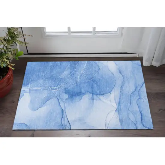 Blue And Ivory Abstract Washable Area Rug With UV Protection Photo 2