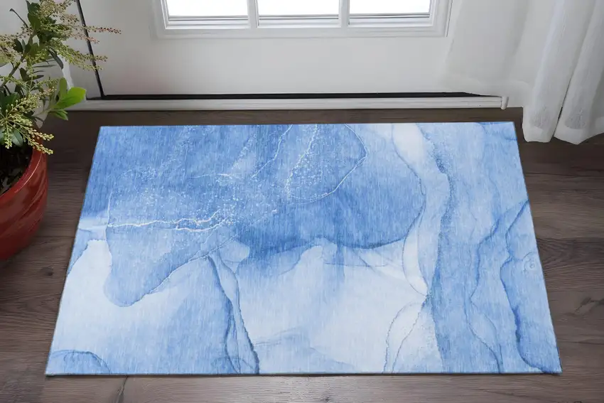 Blue And Ivory Abstract Washable Area Rug With UV Protection Photo 2