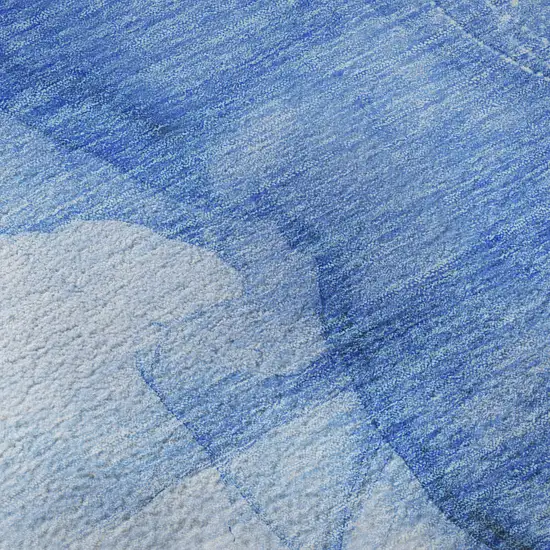 Blue And Ivory Abstract Washable Area Rug With UV Protection Photo 3