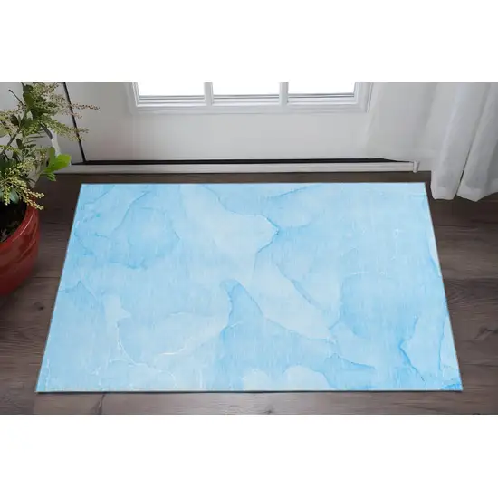 Blue And Ivory Abstract Washable Area Rug With UV Protection Photo 2